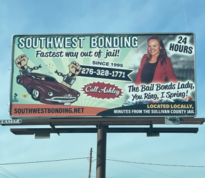 A Man And A Woman Are Holding Hands While Sitting At A Table - Bristol, TN - Southwest Bonding