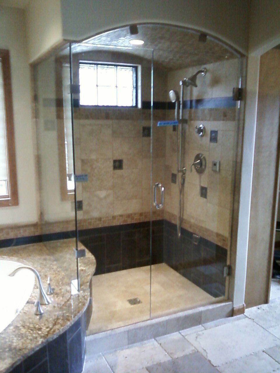 Arched Shower Enclosure — Fort Collins, CO — Ram Glass Service