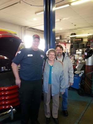 mechanic with customers | LightHouse Automotive