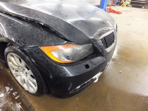 Black Car on Repair Shop — Grand Rapids, MI — Bobs Collision Service