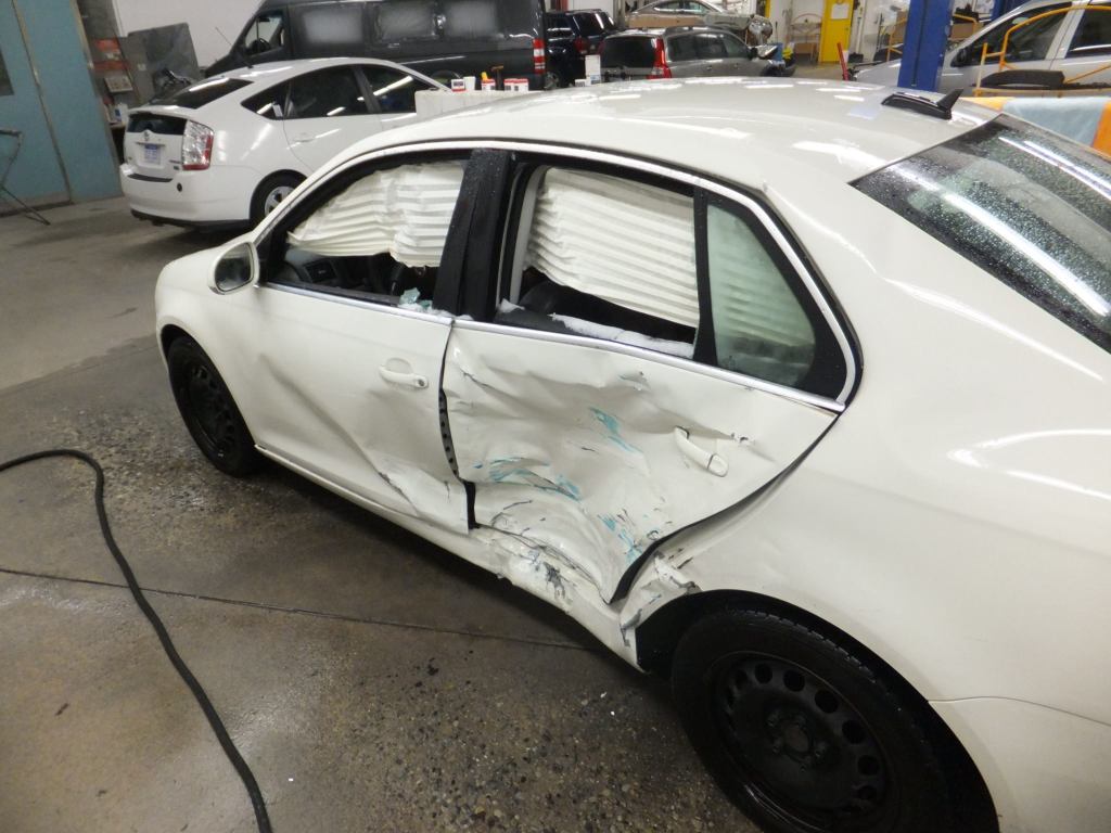 White Car with Dent on Left Side — Grand Rapids, MI — Bobs Collision Service