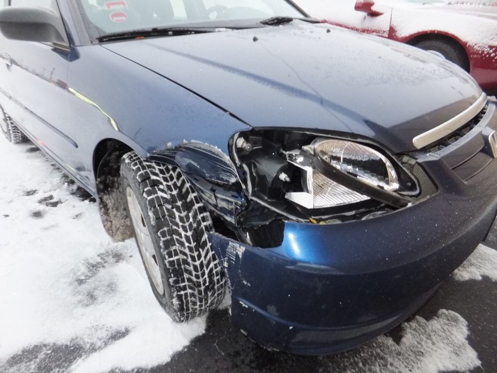 Blue Car with Dent — Grand Rapids, MI — Bobs Collision Service