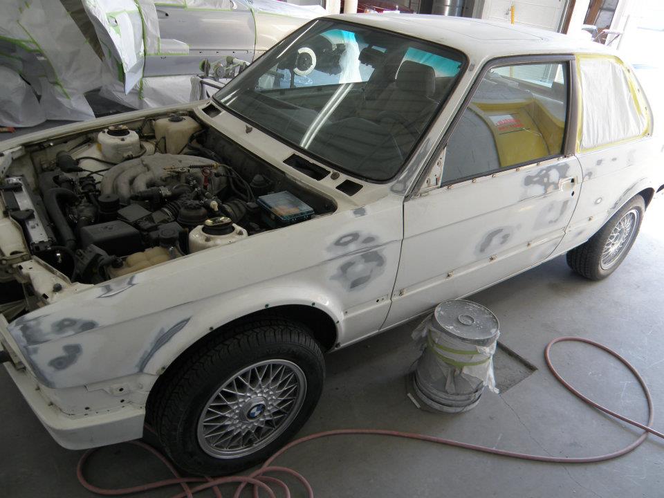 White Car Being Repaired — Grand Rapids, MI — Bobs Collision Service