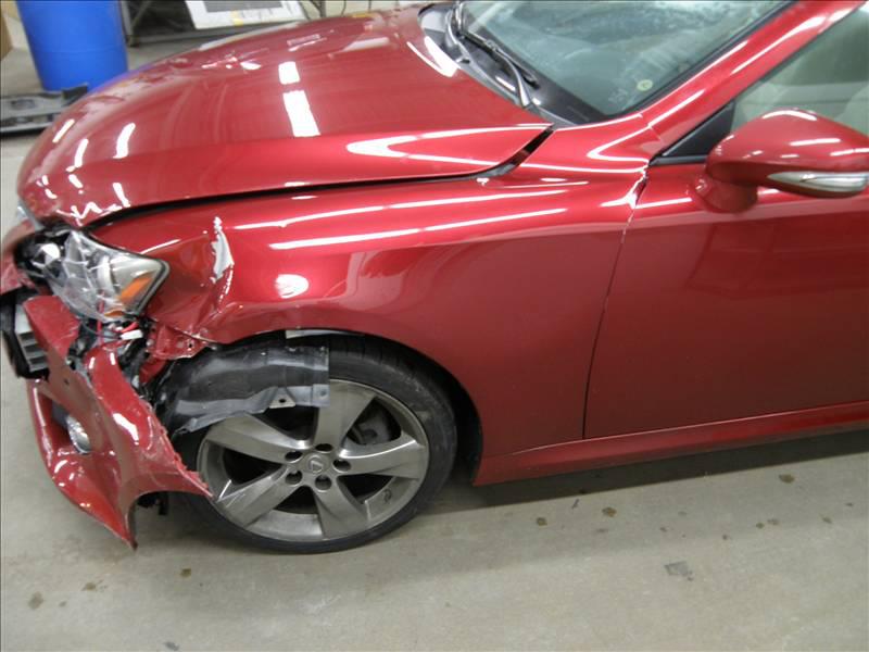 Red Car with Dent Side View — Grand Rapids, MI — Bobs Collision Service