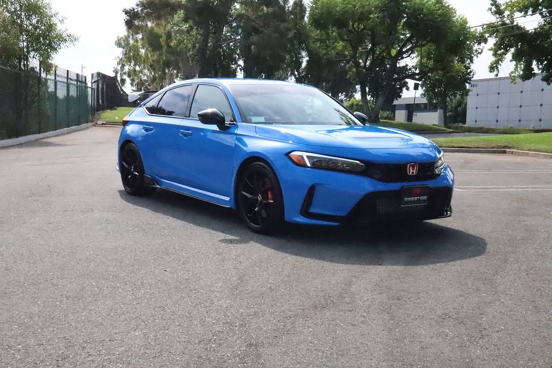 blue vehicle with ceramic coating parked outside