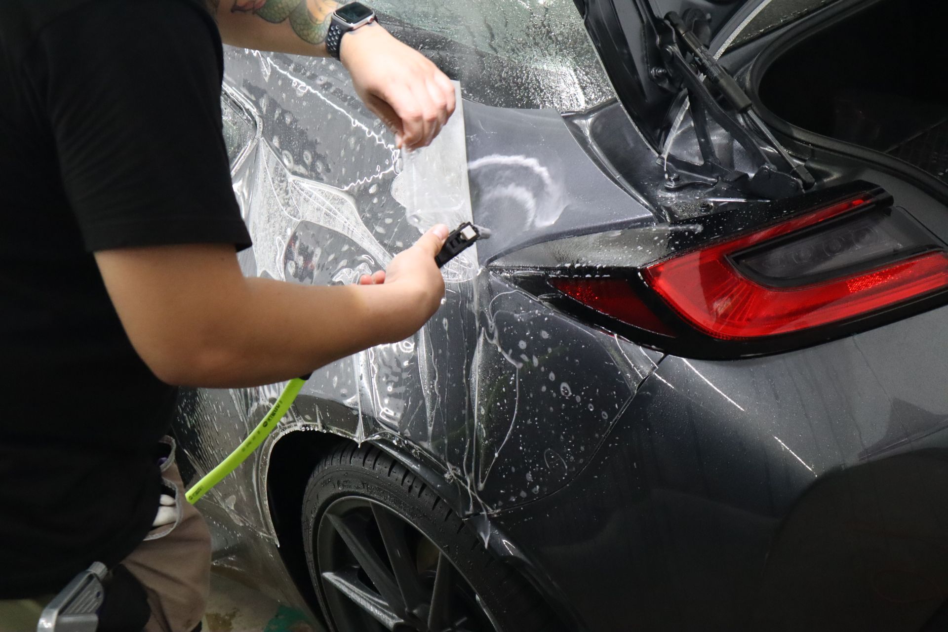 Professional PPF installation on a vehicle