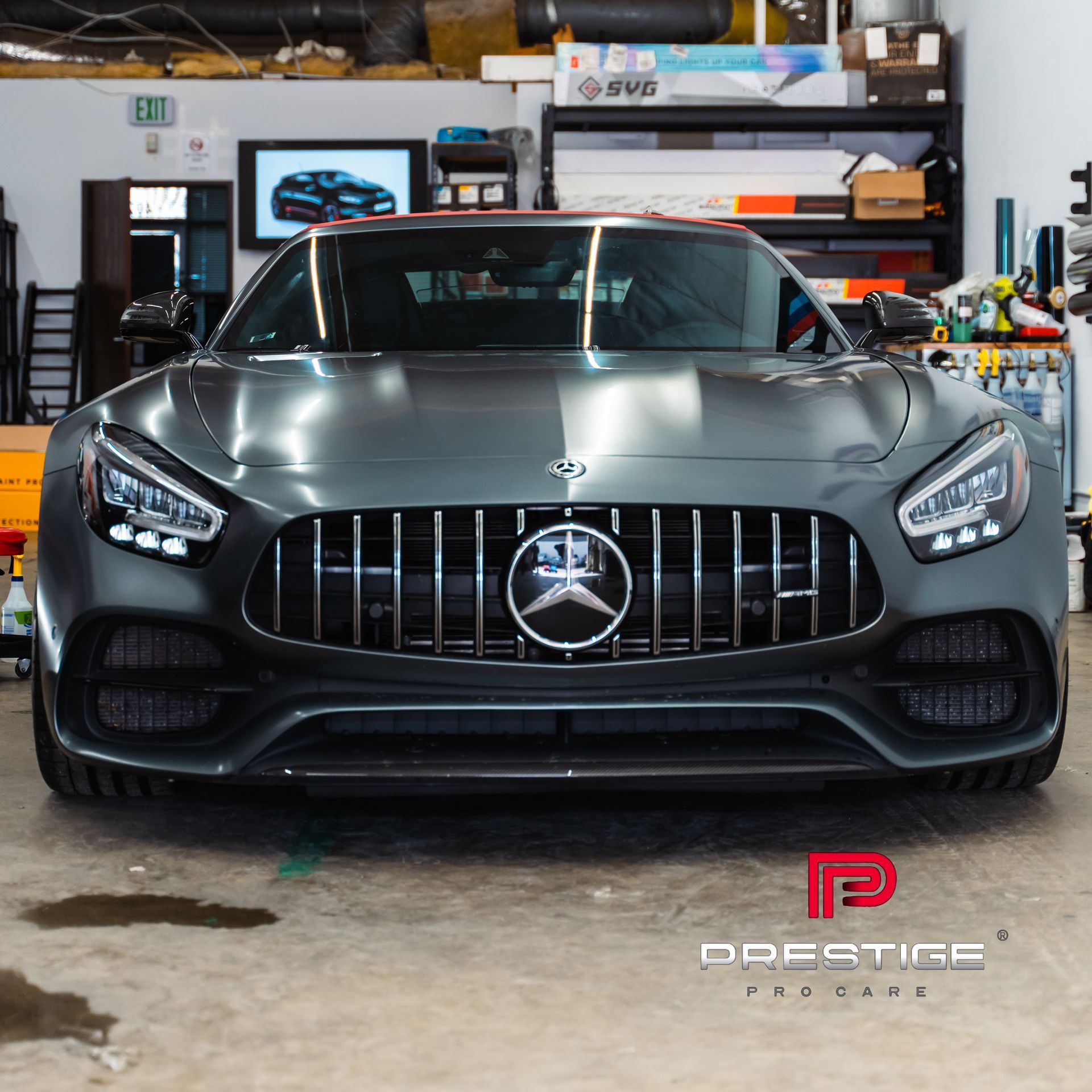 A mercedes benz car is parked in a garage
