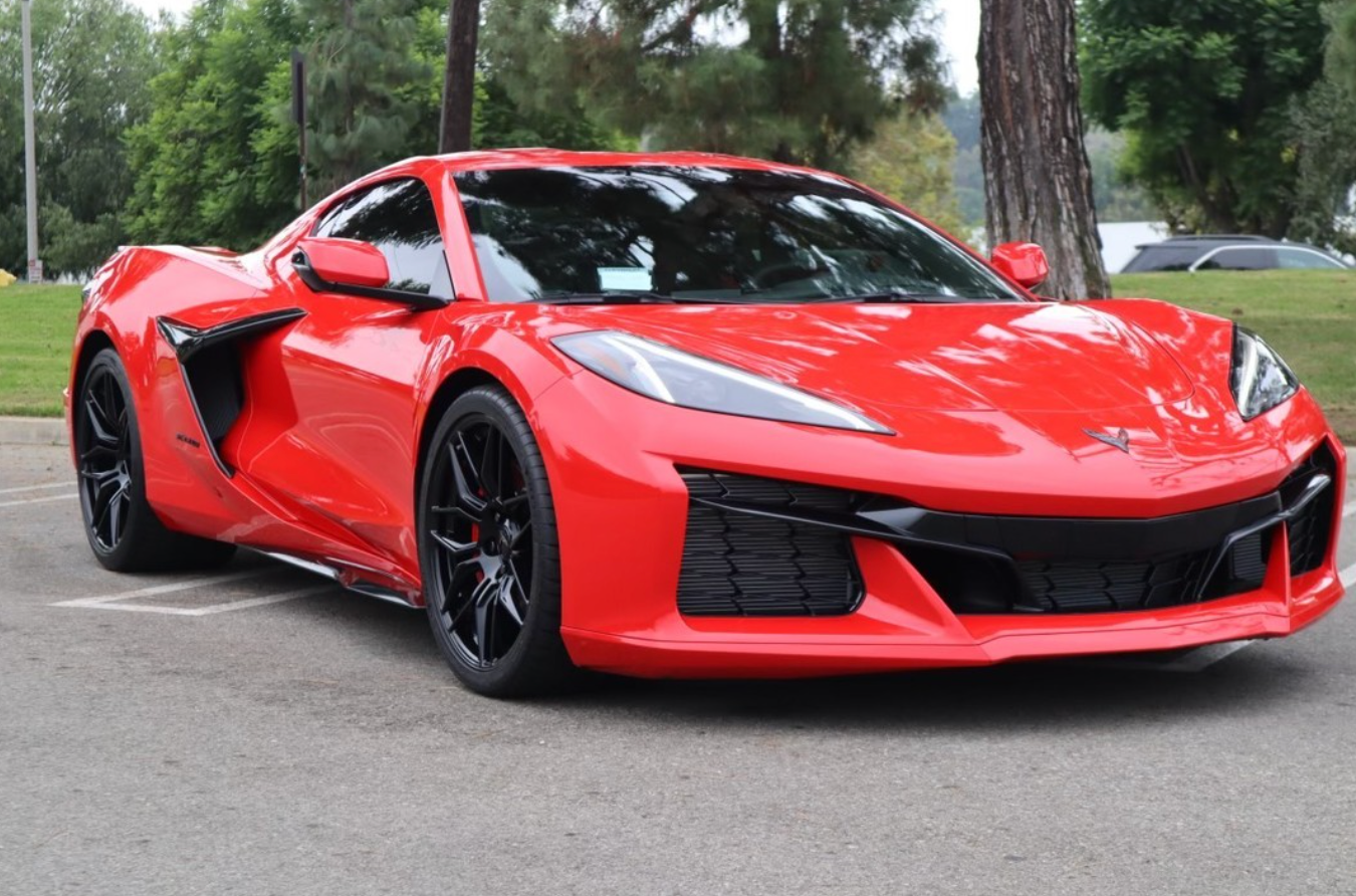 red vehicle with ceramic coating parked outside