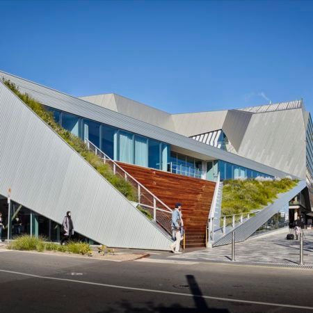 A large building with stairs leading up to it