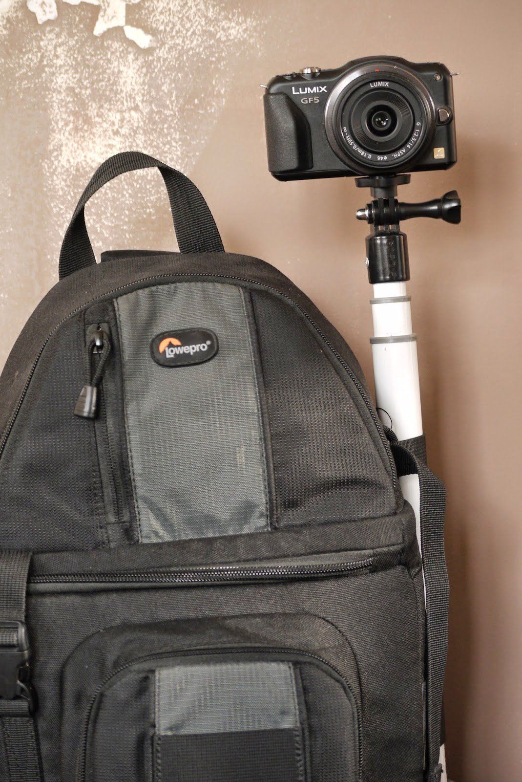The Lowepro Sling Shot 202 AW, with GoPro pole