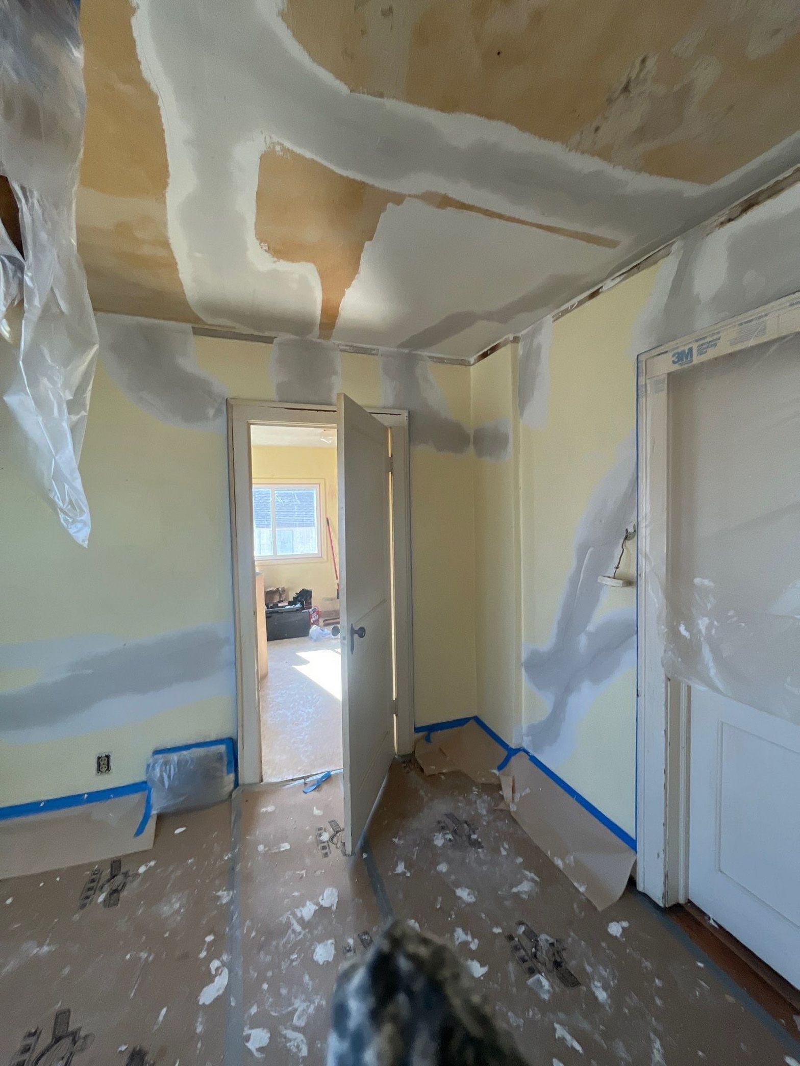 A room with a ceiling that is covered in plaster