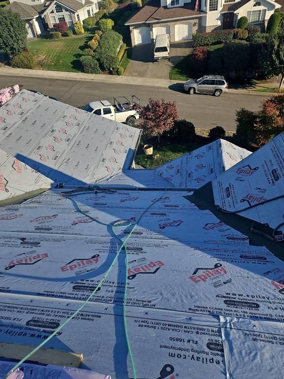 Team Roofing NW crew installing Roofing Tacoma, WA