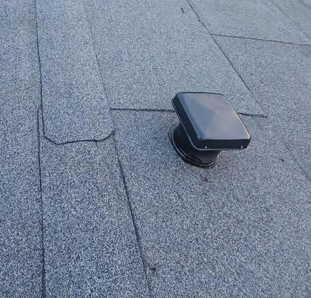 Brown asphalt roof shingles by Team Roofing NW in Kent, WA.