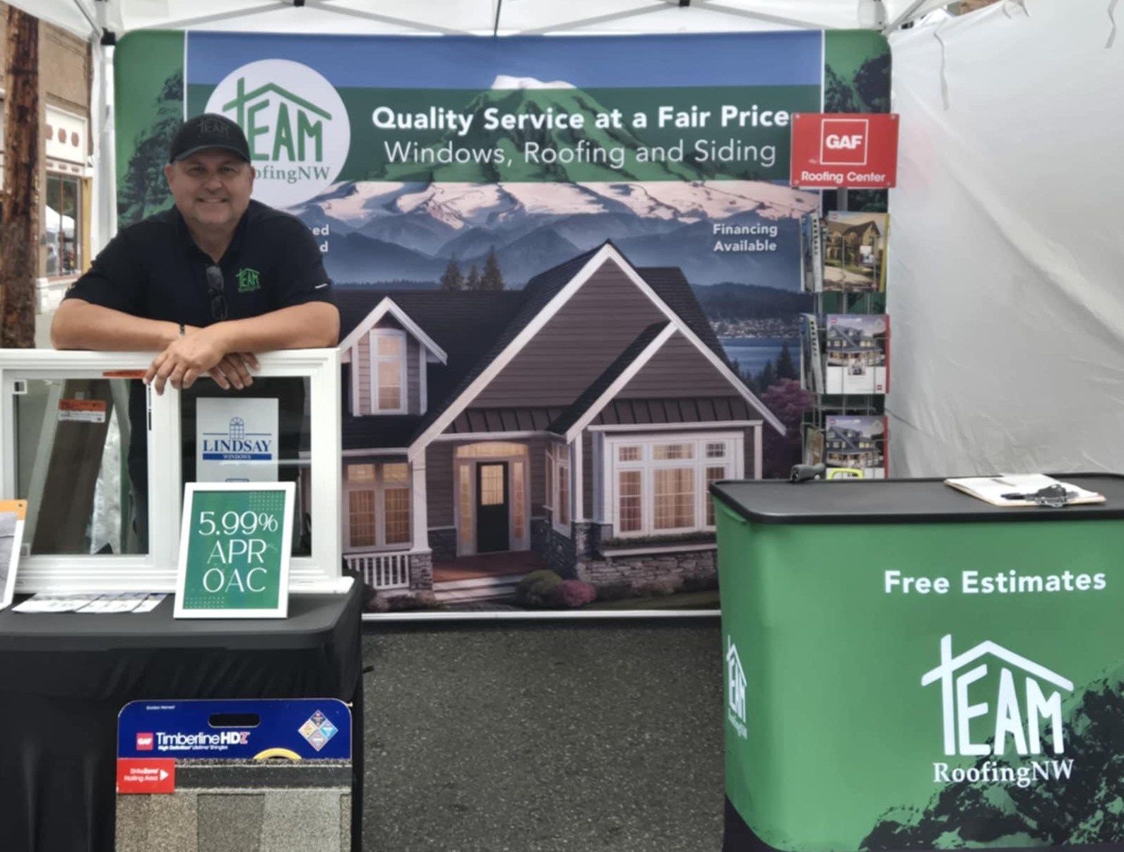 Jean Seward in front of meeker days booth in puyallup, wa