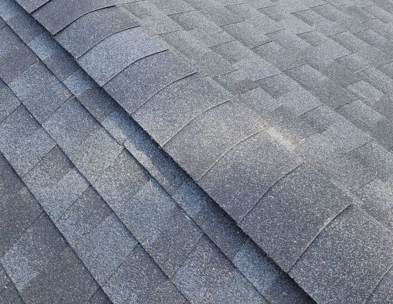 GAF Gray asphalt roof shingles.