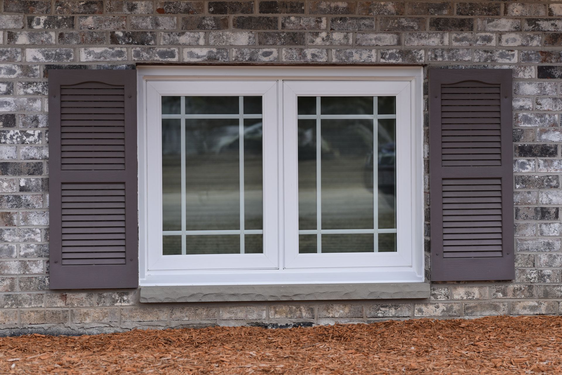 Energy-efficient window installation by Team Roofing NW in Kent, WA.