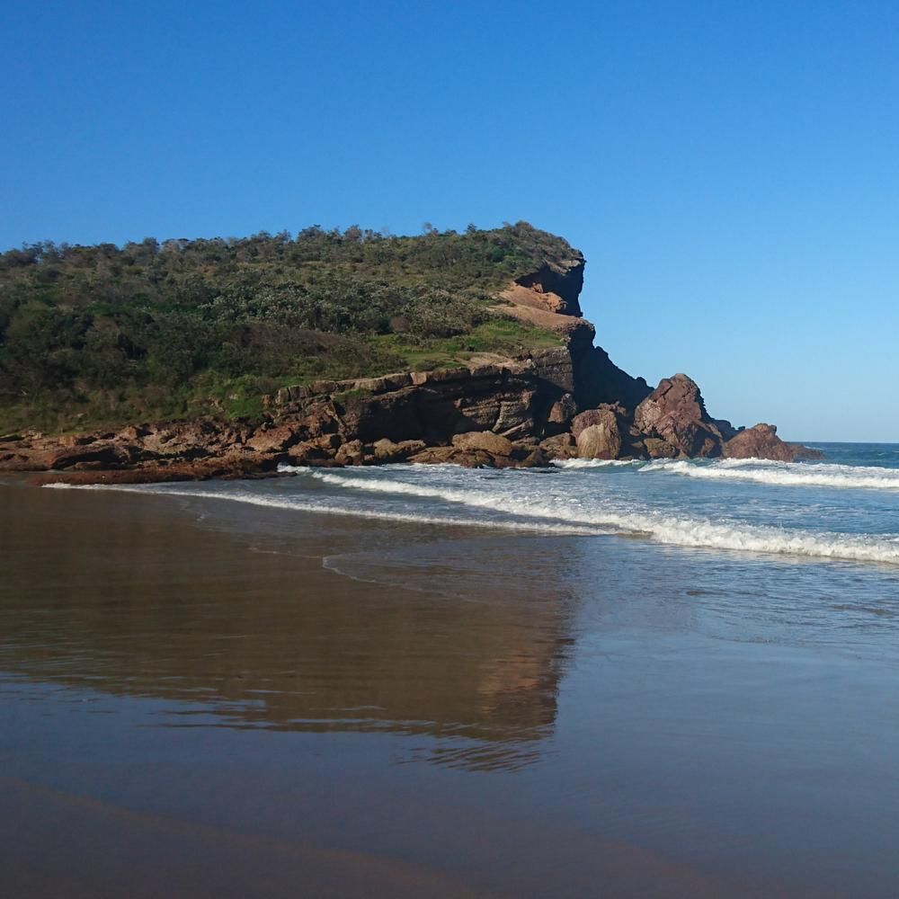 A Sandy Beach With Gentle Waves at the Water's Edge — BCV Storage Centre in Bonny Hills, NSW