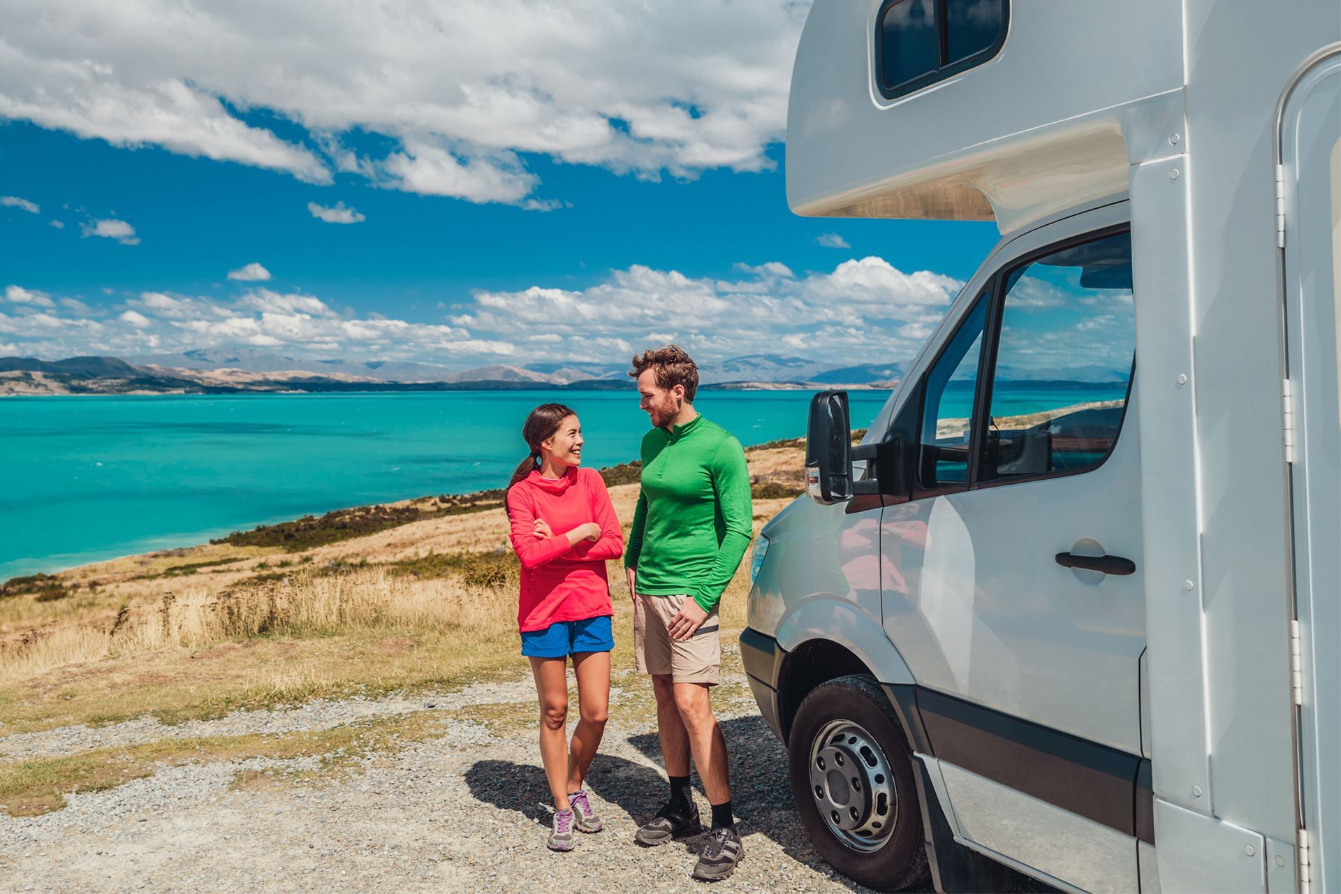 Couple and RV Beside the Seashore
