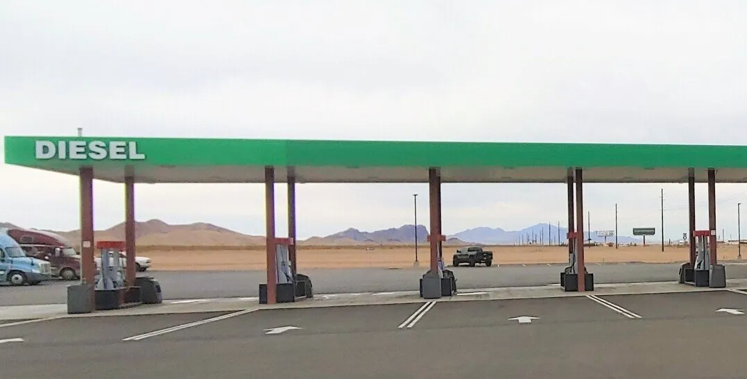 Row of gas station pumps at the Last Stop Travel Center near Las Vegas
