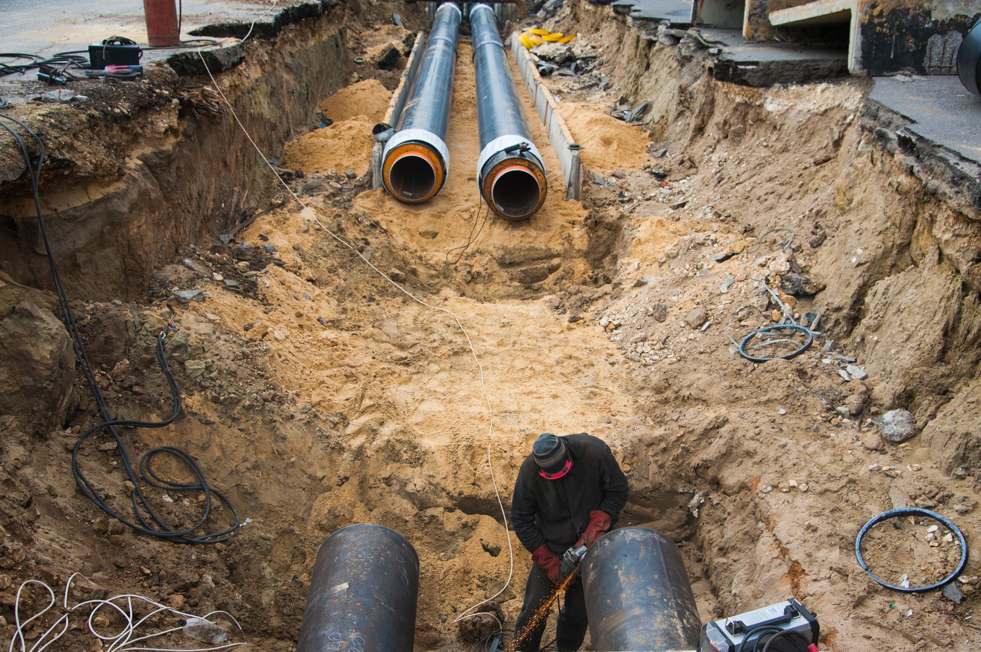 Person working in a trench.