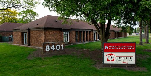 A brick building with the number 8401 on it