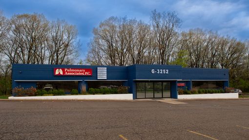 A blue building with the number g-3232 on it