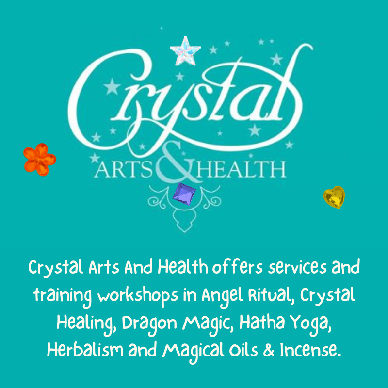 A blue sign that says crystal arts and health