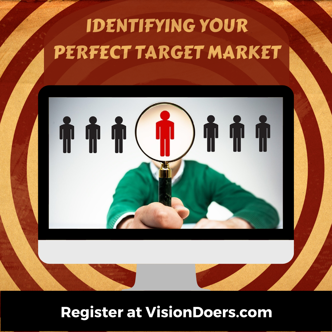 A man is holding a magnifying glass in front of a computer screen that says identifying your perfect target market