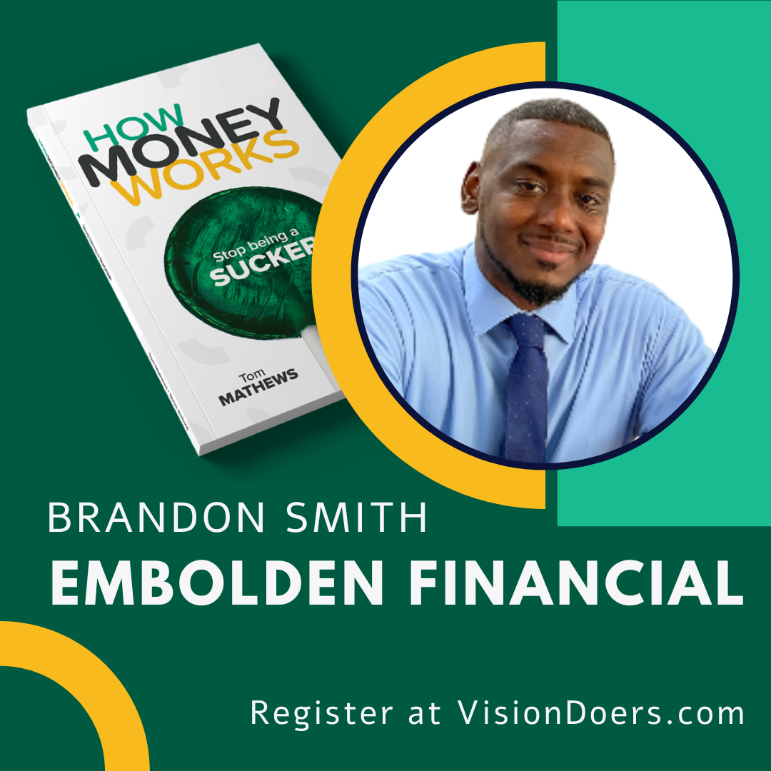 A man in a blue shirt and tie is standing next to a book titled how money works
