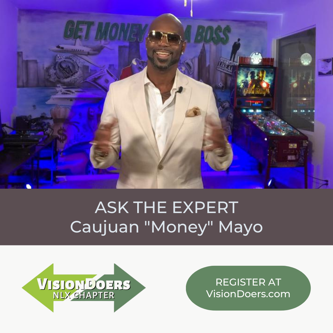 A man in a suit stands in front of a sign that says get money a boss