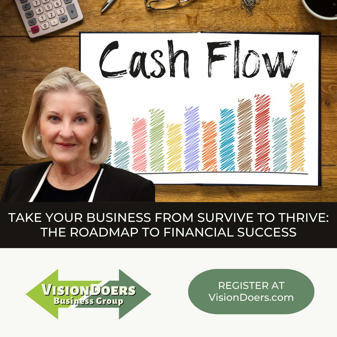 A woman is standing in front of a graph that says cash flow