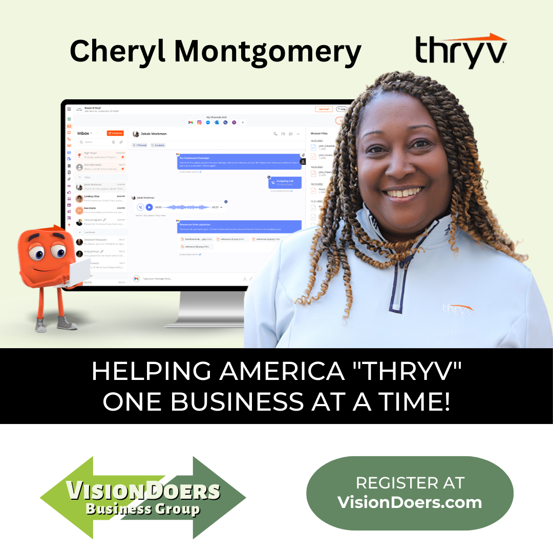 A woman is standing in front of a computer screen.