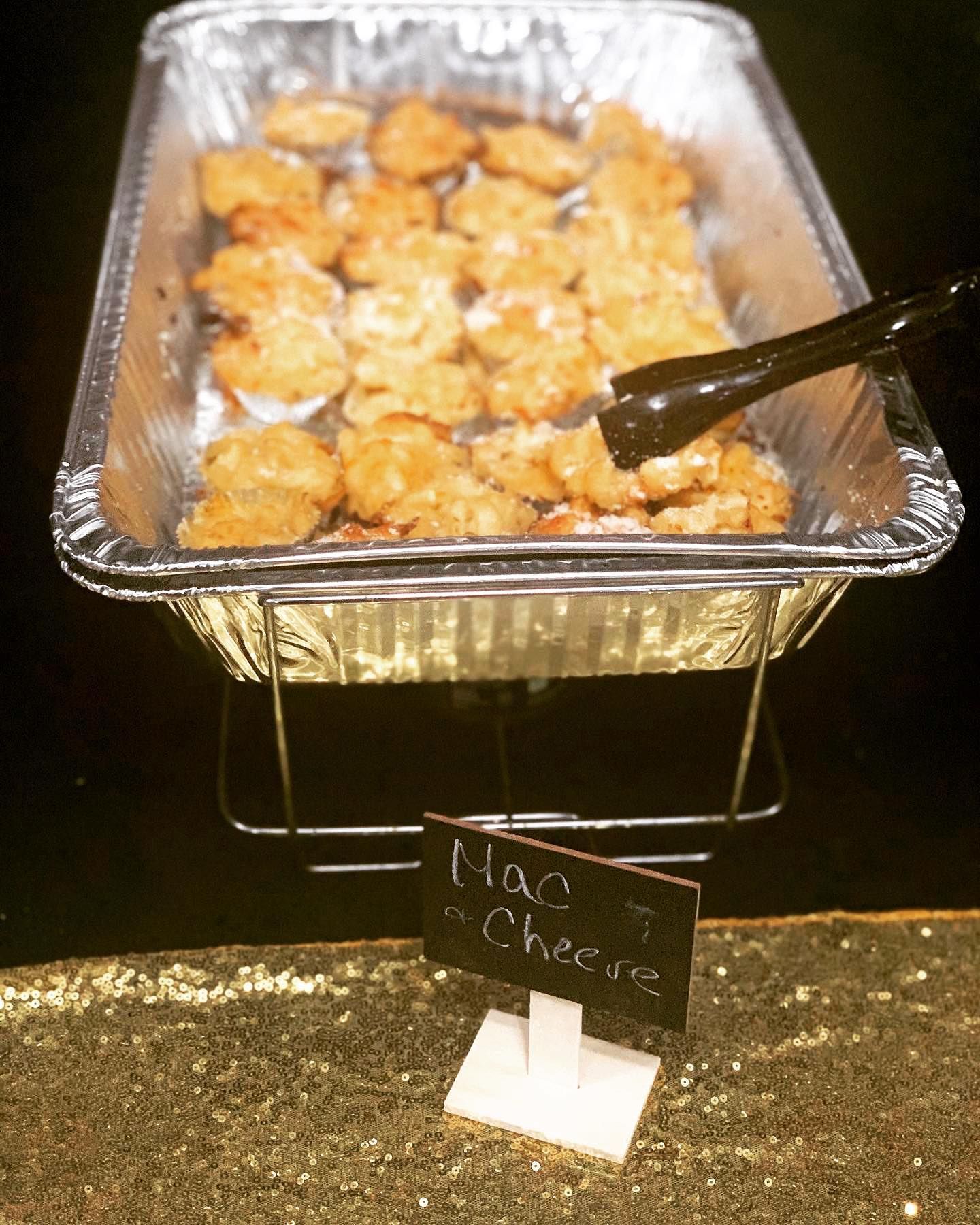 A tray of food with a sign that says cheese on it.