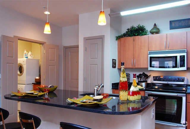 apartment kitchen at Ventura Lofts apartment homes in Houston, TX.