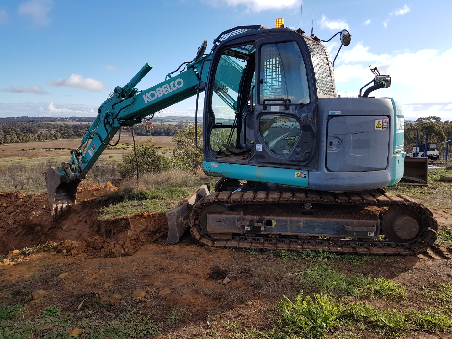 Excavators Digging Dirt — Excavators in Wedderburn