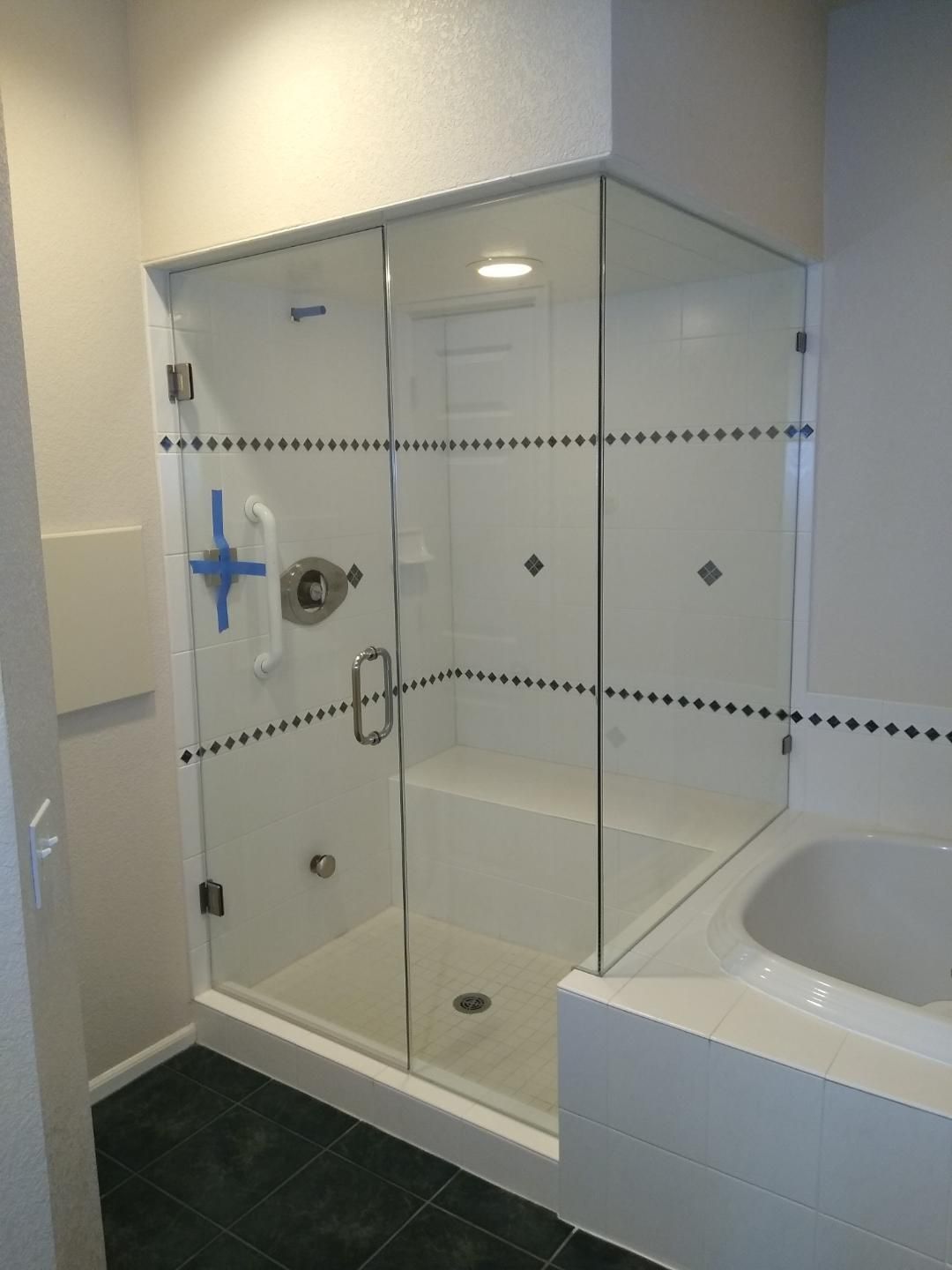 Frameless shower door installation