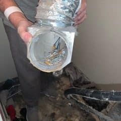 Man Holding Duct - Bluffton, SC - Ugly Duct Cleaning