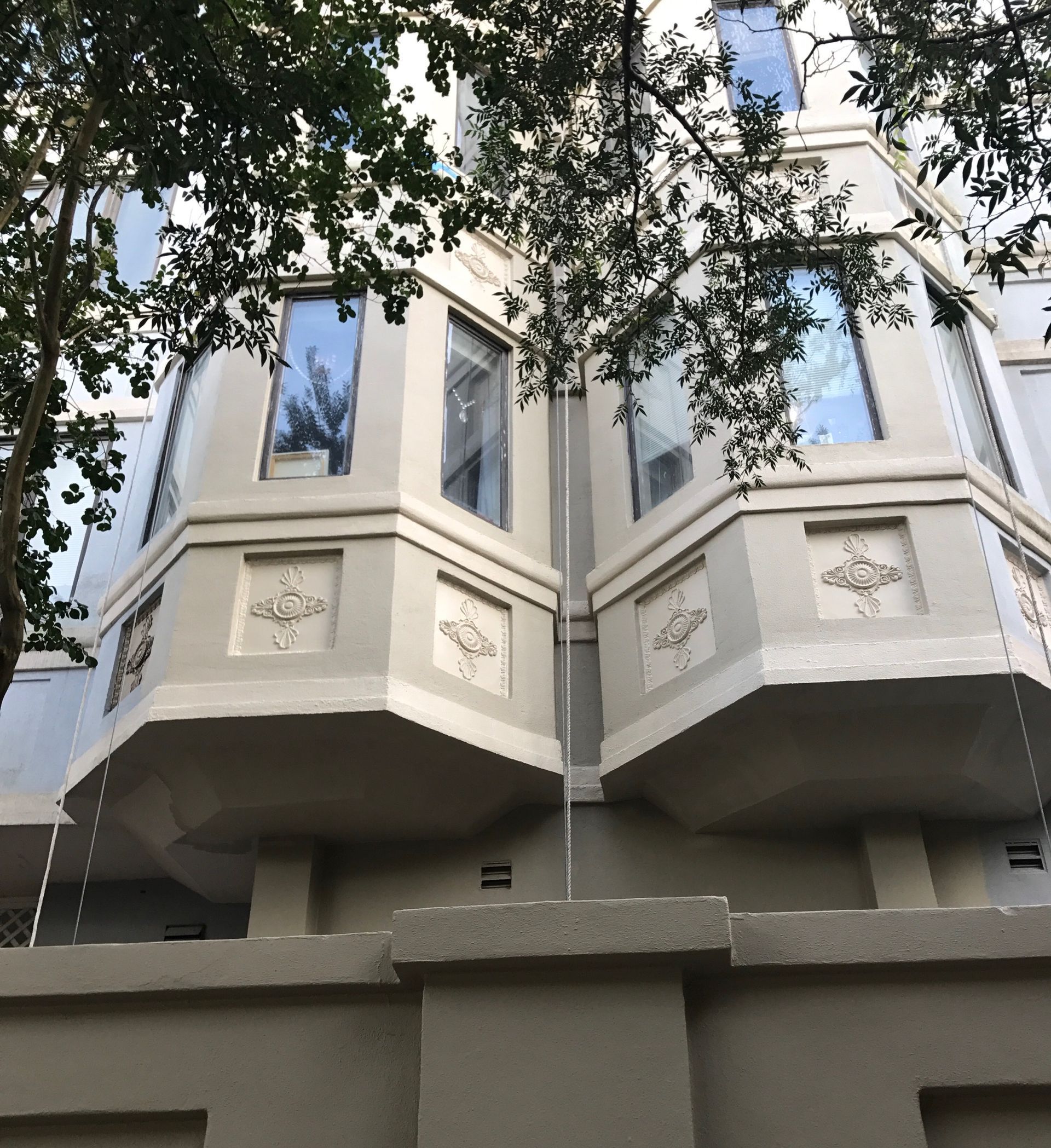 A building with a lot of windows and balconies
