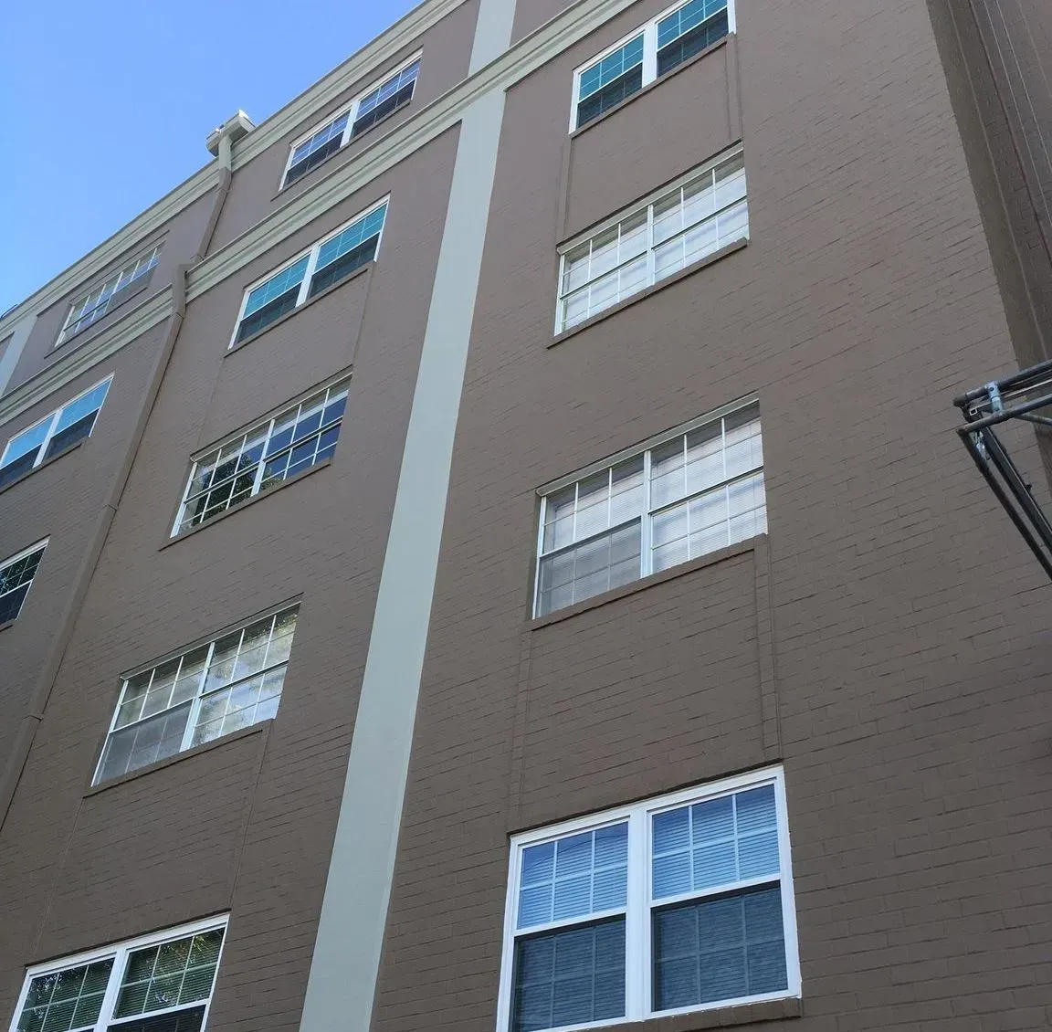 Looking up at a building with lots of windows