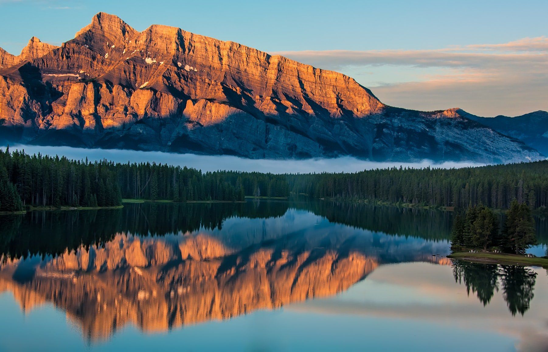 Mount Rundle reflected in Two Jack Lake in Banff National Park.