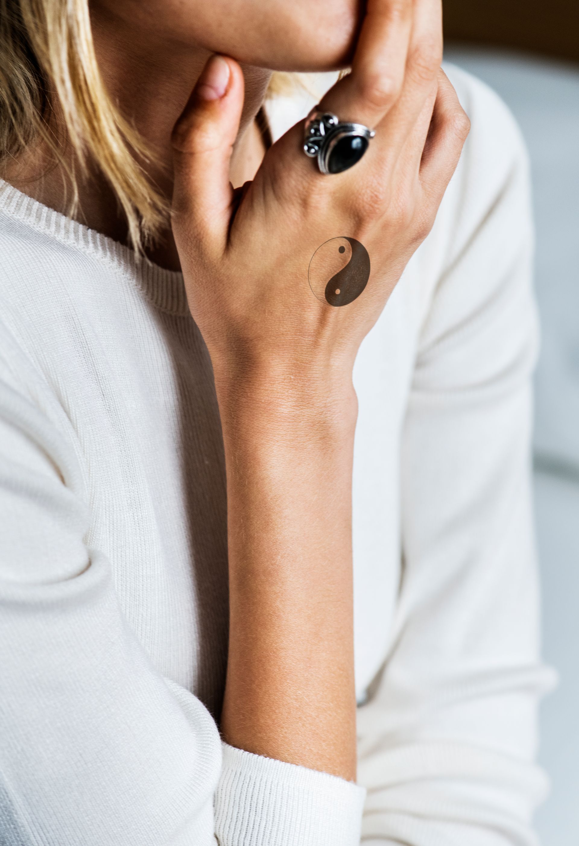 closeup of hand tattoo on woman