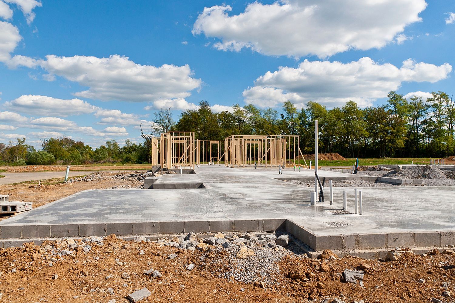View of a new house construction on a slab foundation. View of a new house construction on a slab foundation.