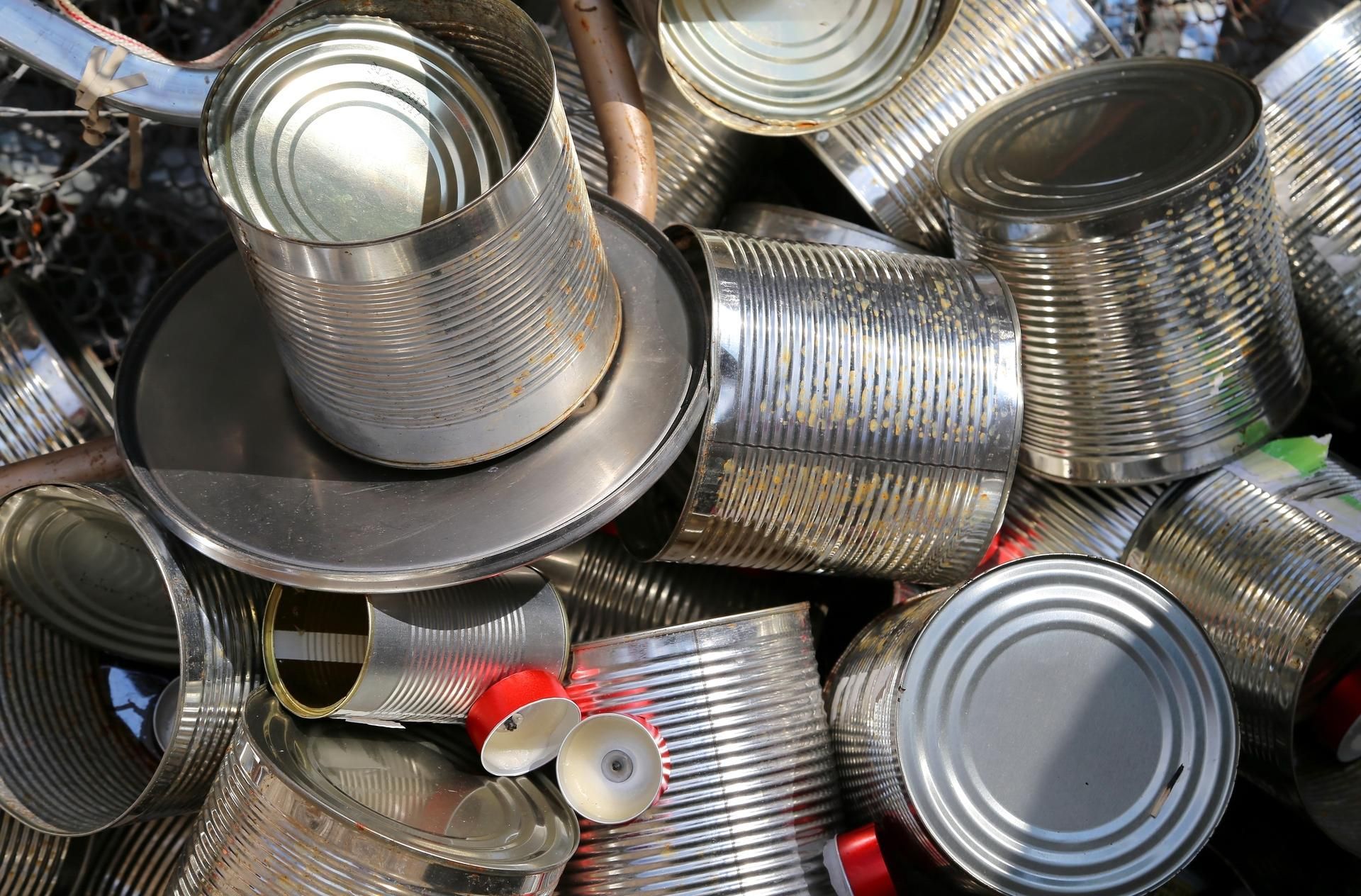 A pile of tin cans stacked on top of each other