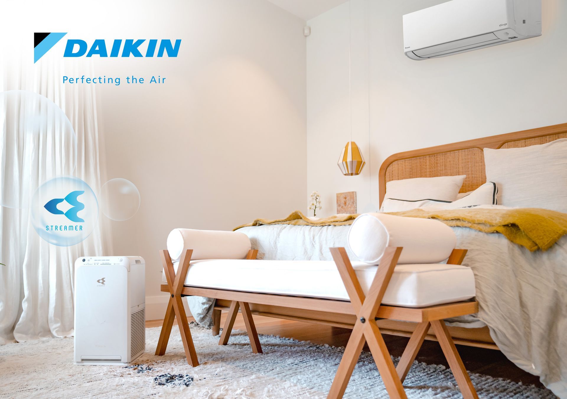 Bedroom with a Daikin Alira air conditioner/heat pump and stand alone air purifier