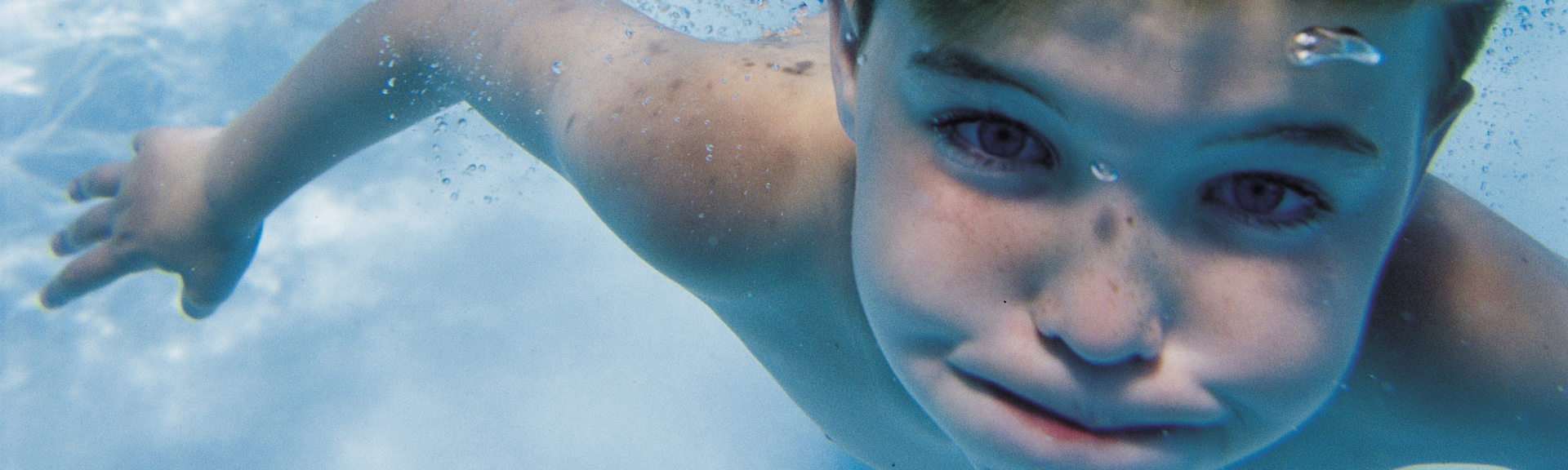 Boy in swimming pool
