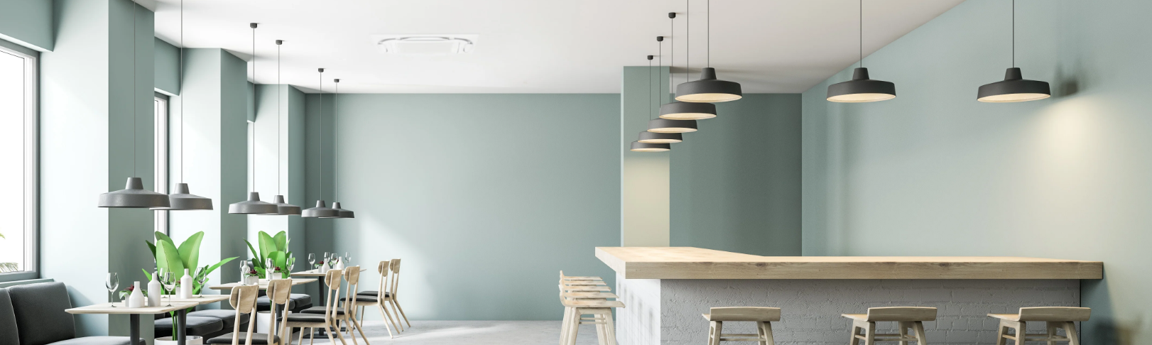 Daikin cassette heat pump in ceiling of modern clean cafe setting