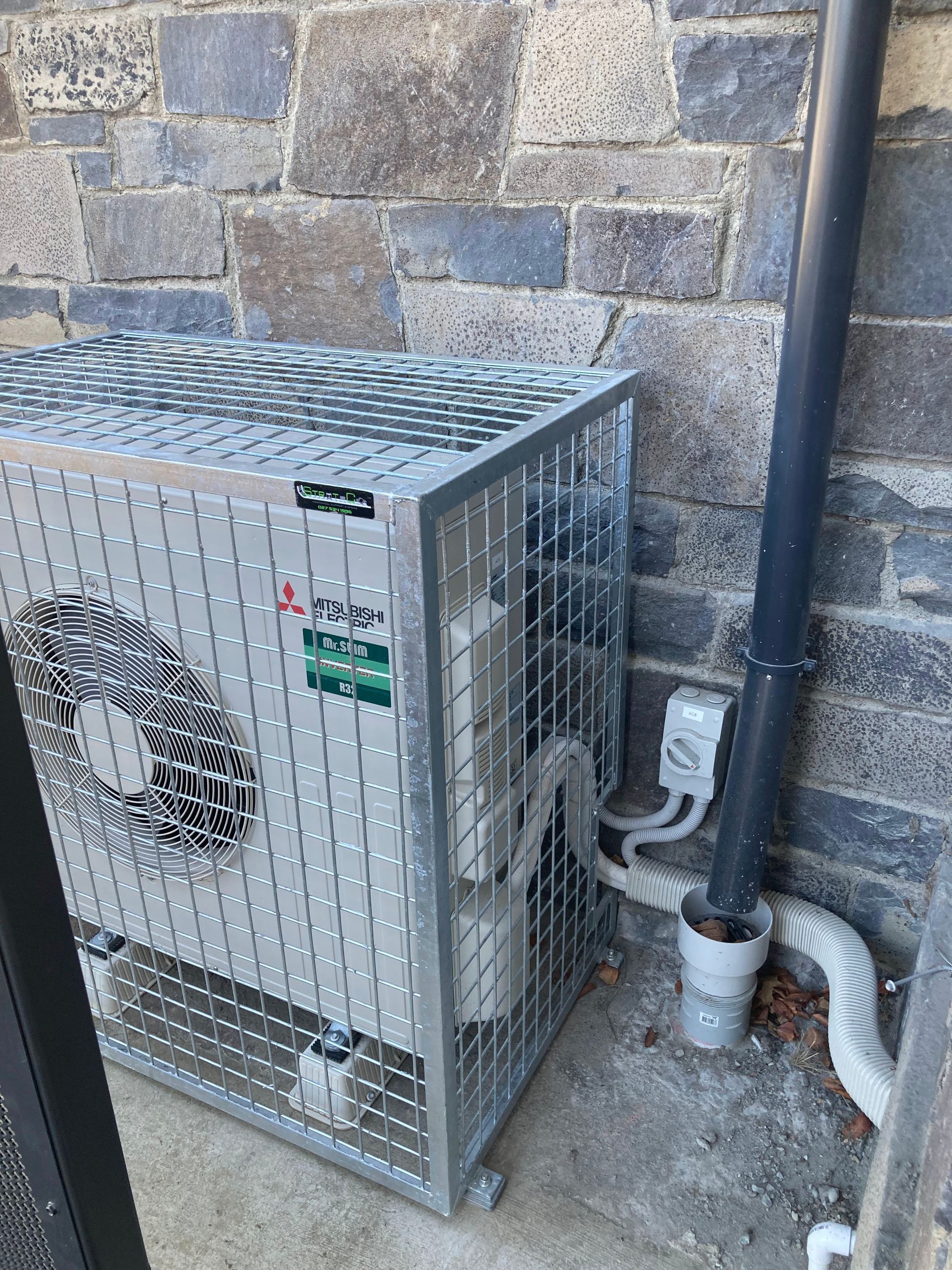 Outdoor heat pump cage
