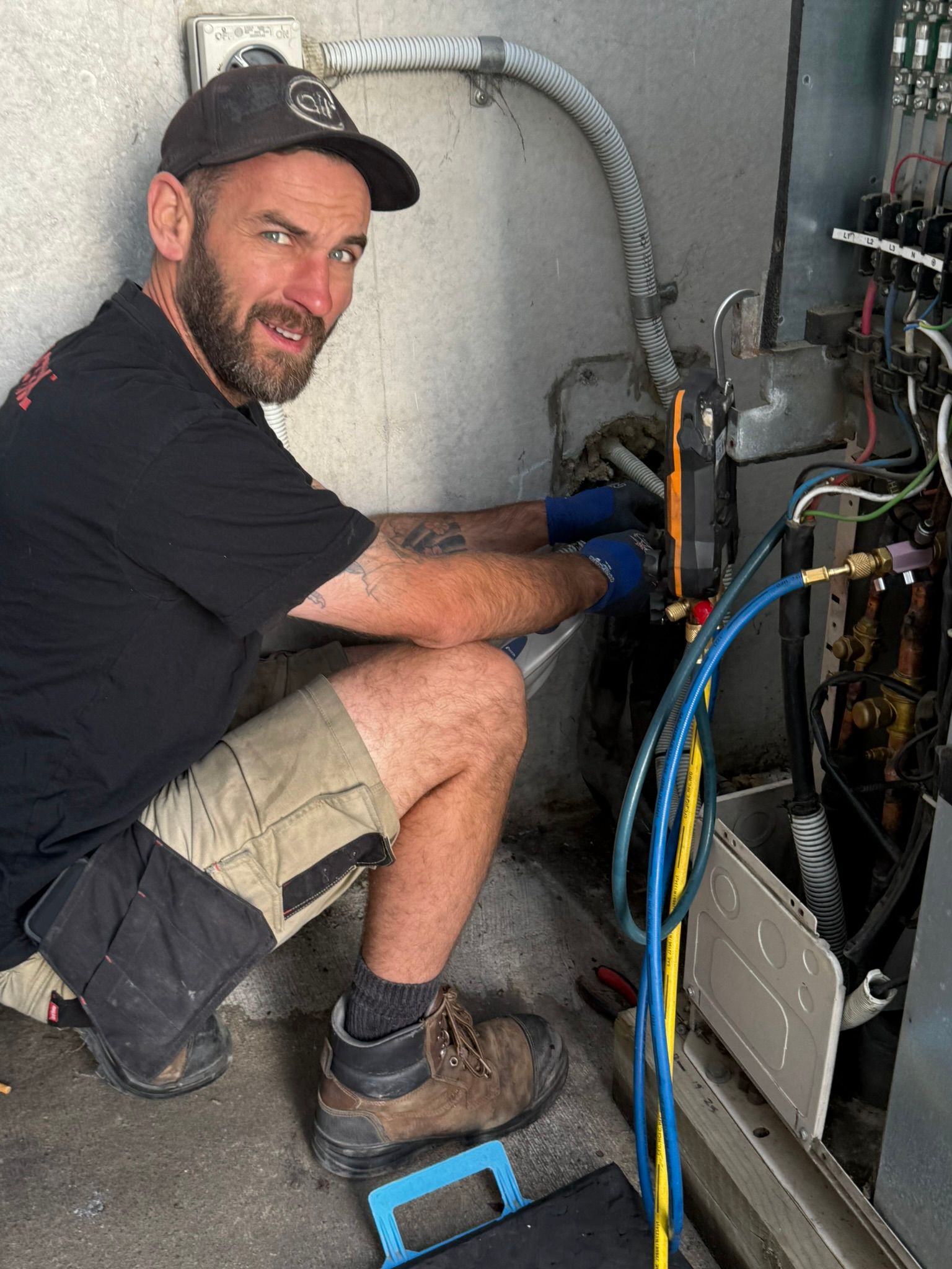 The Heat Pump People installation technician installing Daikin VRV outdoor unit.
