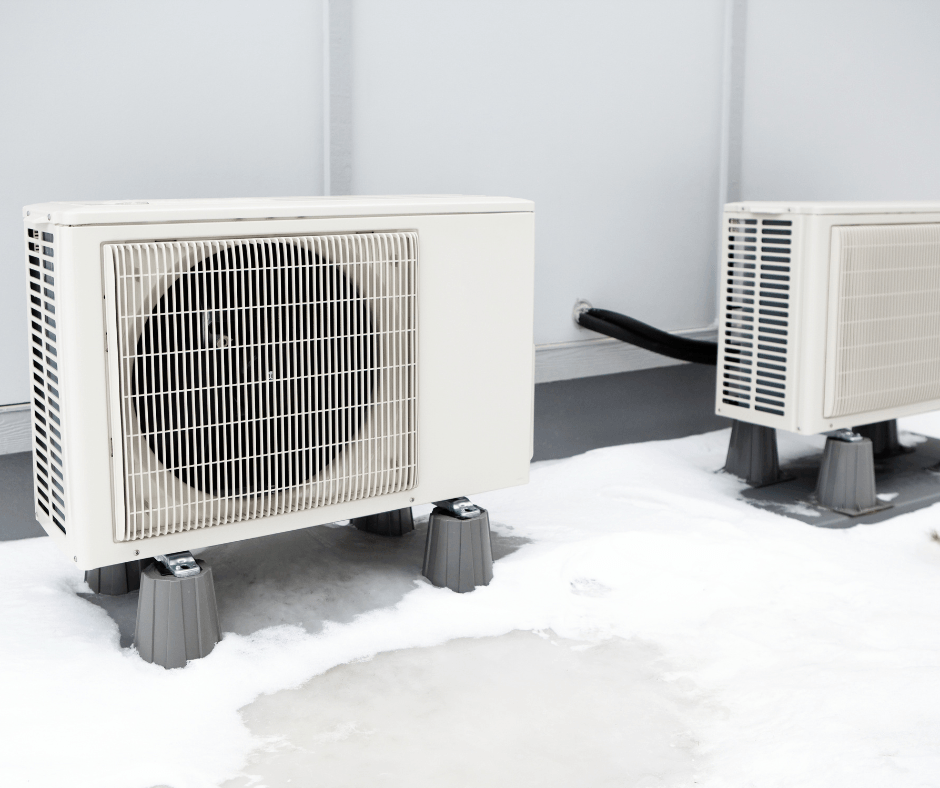 Outdoor heat pump units with snow in defrost cycle