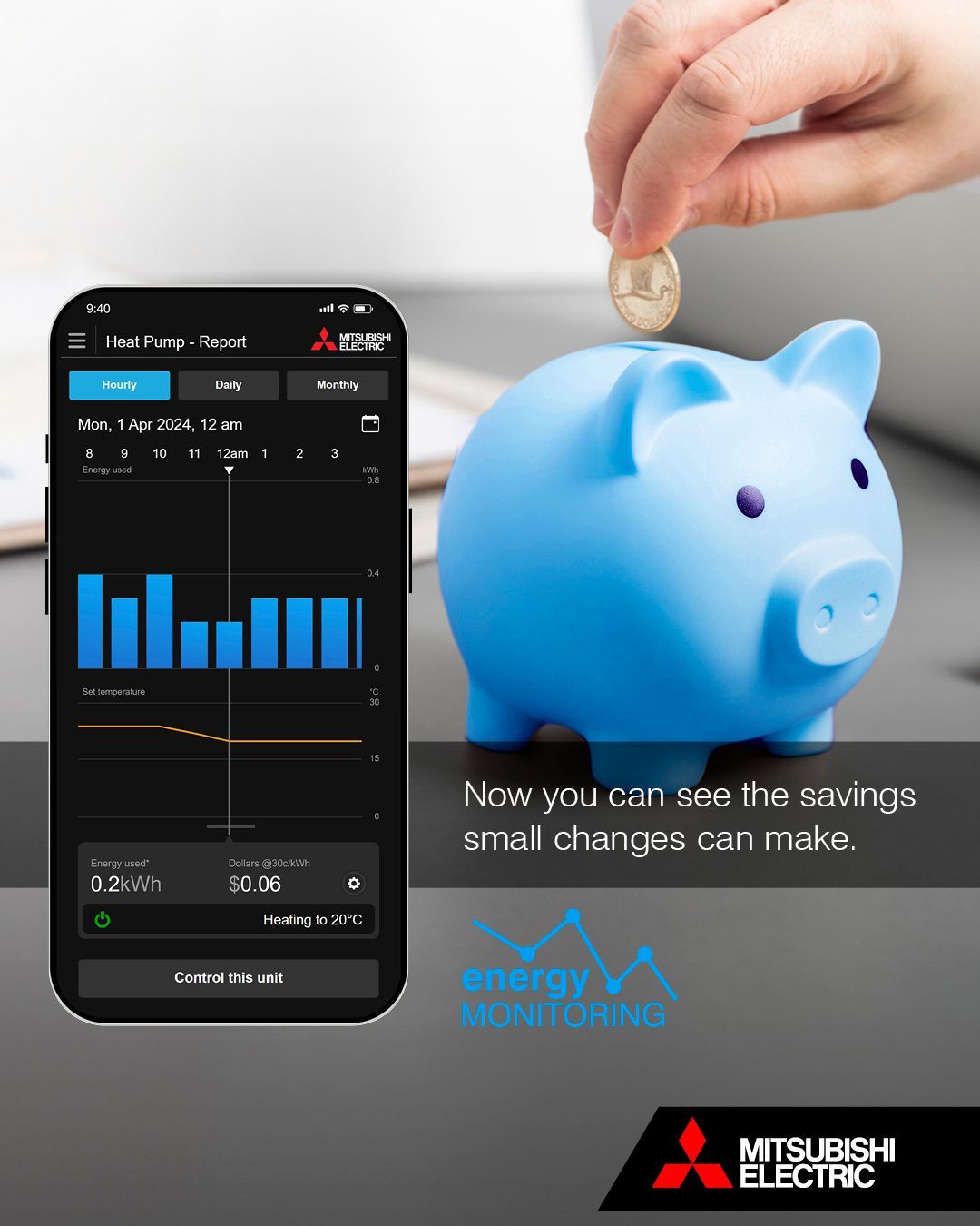 Blue piggie bank next to a mobile phone showing Mitsubishi Electric's Heat Pump Energy Monitoring 